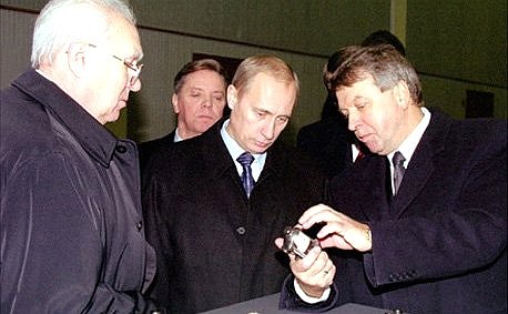 Vladimir Putin at the Centre for the Production of Prosthetic and Orthopaedic Equipment of the RSC Energia\'s experimental engineering plant. Vladimir Putin with Yury Semyonov (left), RSC Energia\'s president, and Alexander Strekalov, the corporation\'s first vice-president, at the exhibition of Russian-made equipment for the disabled.