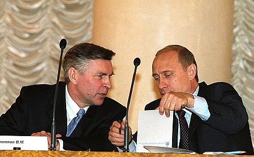 President Putin with Education Minister Vladimir Filippov at the World Forum of Foreign Graduates of Russian (Soviet) Higher Education Institutions.