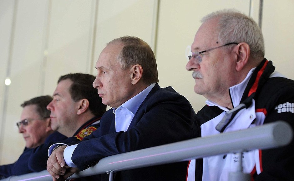 At the Russia-Slovakia ice hockey match at the Bolshoi Ice Arena. With President of Slovakia Ivan Gasparovic (left) and Prime Minister Dmitry Medvedev.