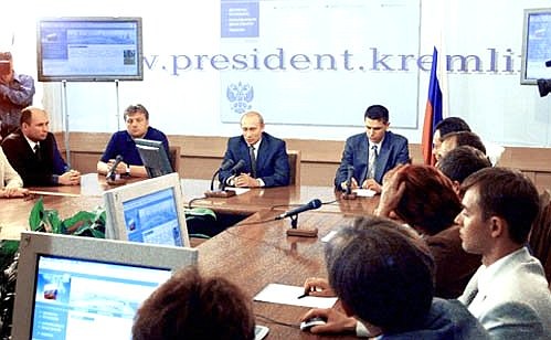 President Vladimir Putin meeting the winners of a competition for the best design of the web site of the Russian President, members of the panel of judges and designers of the new site.