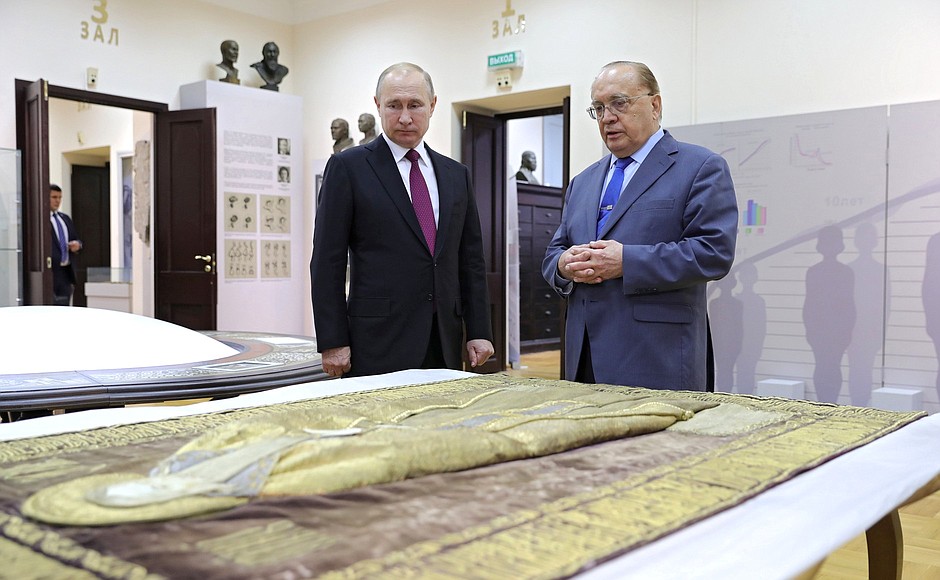 While at Moscow State University, Vladimir Putin was shown the veil from the reliquary of St Zosima of Solovki at the MSU Museum of Anthropology. With MSU Rector Viktor Sadovnichy.