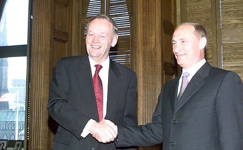 President Vladimir Putin and Canadian Prime Minister Jean Chretien.