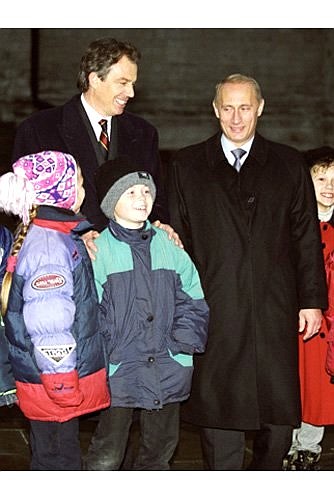 President Putin taking a walk in the Kremlin with British Prime Minister Tony Blair.