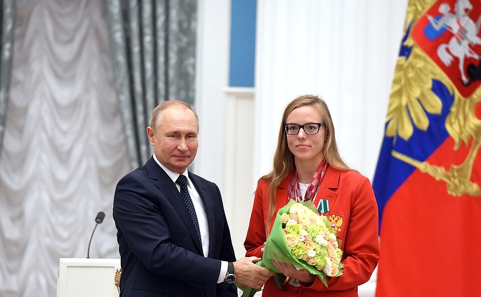 Presenting state decorations to winners of the 2020 Summer Paralympic Games in Tokyo. Darya Pikalova, winner of a gold medal, two silvers and a bronze in swimming at the Paralympics, receives the Order of Friendship.