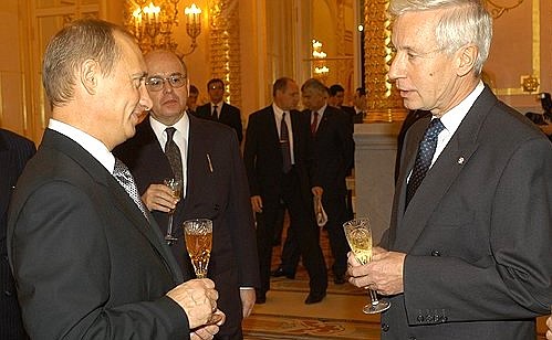 President Putin with Austrian Ambassador Martin Vukovic.