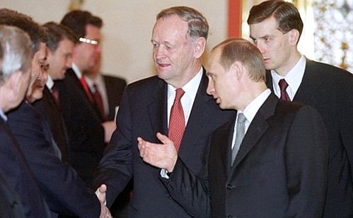 President Putin with Canadian Prime Minister Jean Chretien during a presentation ceremony for negotiators from the Russian side.