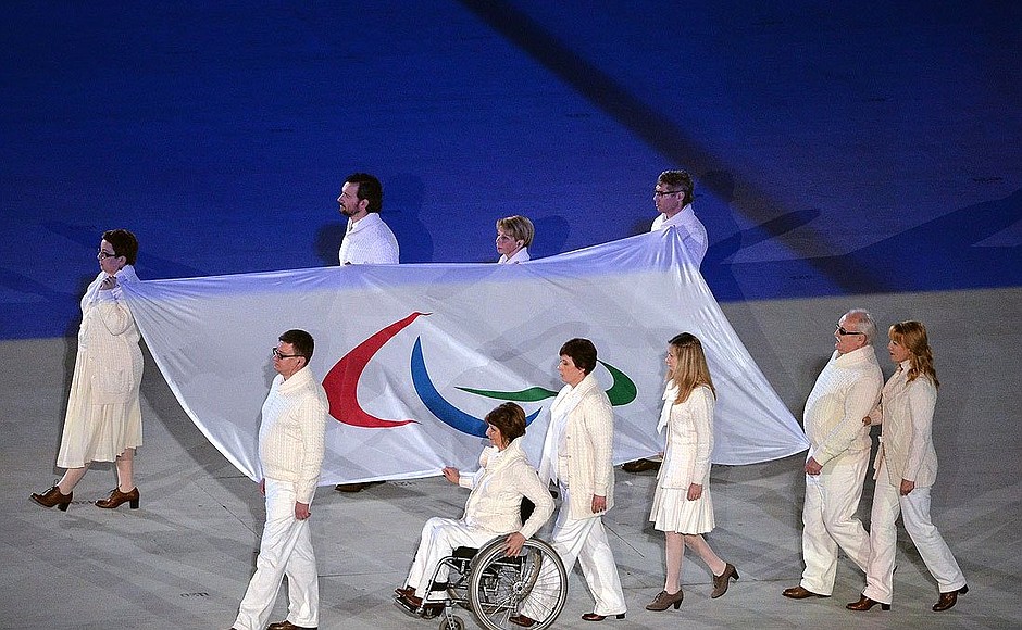 XI Paralympic Winter Games opening ceremony. Carrying the Russian national flag.