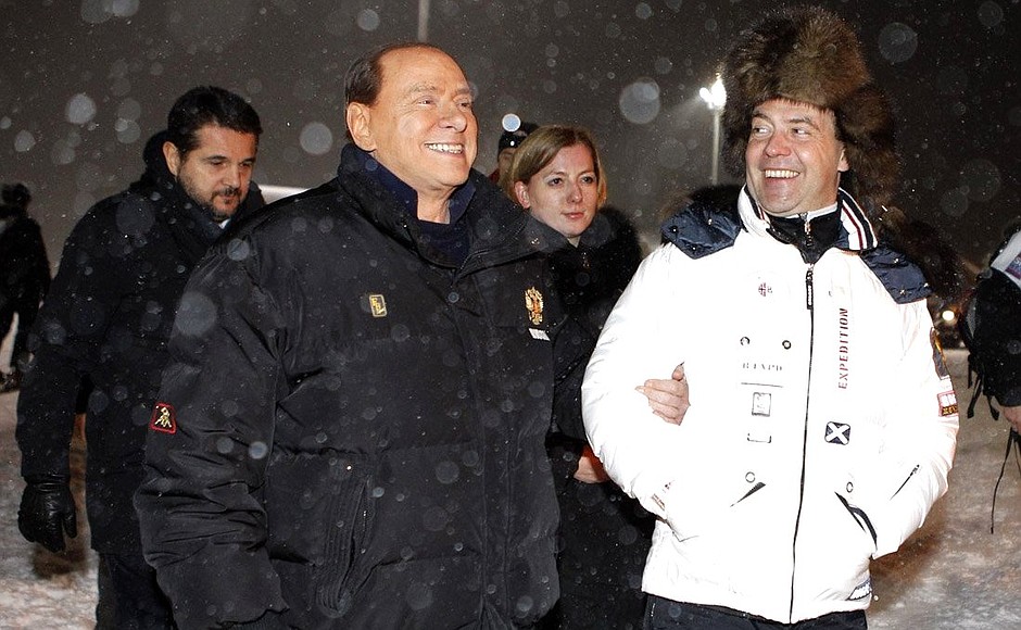 With Silvio Berlusconi.