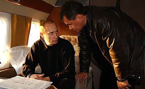 President Putin with Sergei Shoigu, Russia\'s Emergencies Minister, on the way to the Adygheyan village Yelenovskoye.