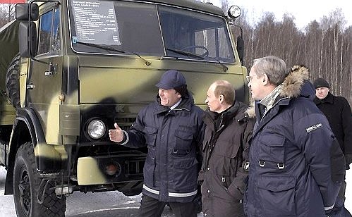 At the scientific research for testing and development of automobile equipment (Central vehicle testing ground). On the President\'s left is KamAZ Chief Designer Denis Valeyev, and on his right is KamAZ General Director Sergei Kogogin.