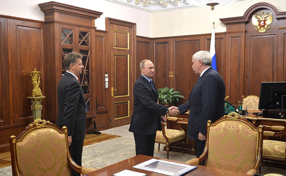 Working meeting with Minister of Transport Maxim Sokolov (left) and Governor of St Petersburg Georgy Poltavchenko.
