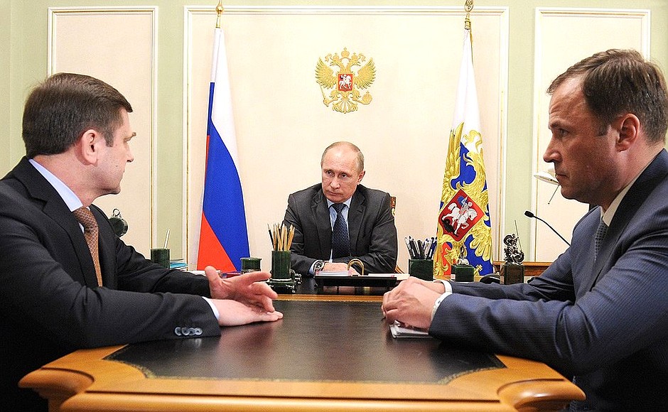 With Head of Roscosmos Oleg Ostapenko (left) and Deputy Head of Roscosmos Igor Komarov.