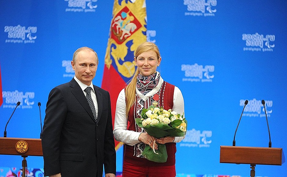 Meeting with XI Winter Paralympics medallists. Alyona Kaufman, who won three gold medals, a silver and a bronze medal in biathlon and cross-country skiing, was awarded the Order for Services to the Fatherland IV degree.