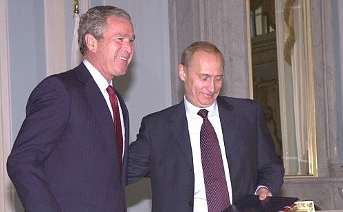 President Vladimir Putin with President George Bush of the United States after exchanging instruments of ratification for the Strategic Offensive Reductions Treaty.