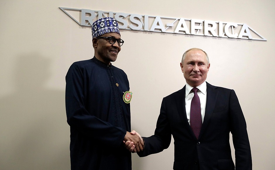 With President of Nigeria Muhammadu Buhari.