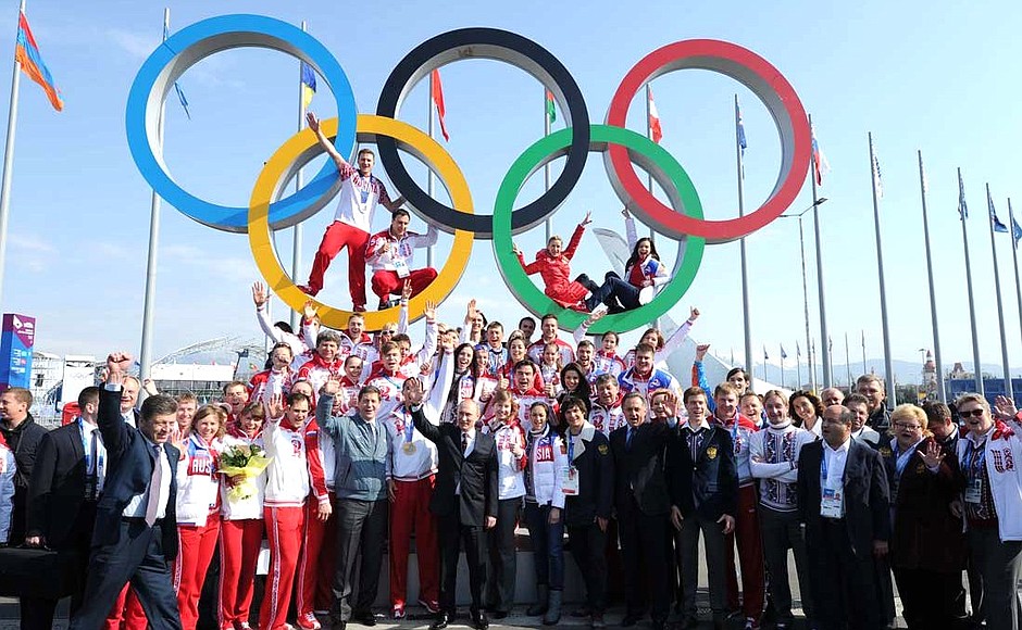With medal winners at the XXII Winter Olympics during a visit to the Olympic Park.
