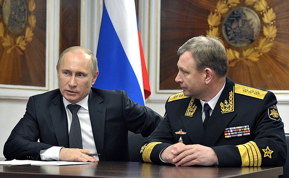 With Russian Navy's Commander-in-Chief Viktor Chirkov during a videoconference with Defence Minister Sergei Shoigu, who is aboard the nuclear-powered missile submarine Yury Dolgoruky in Severodvinsk.