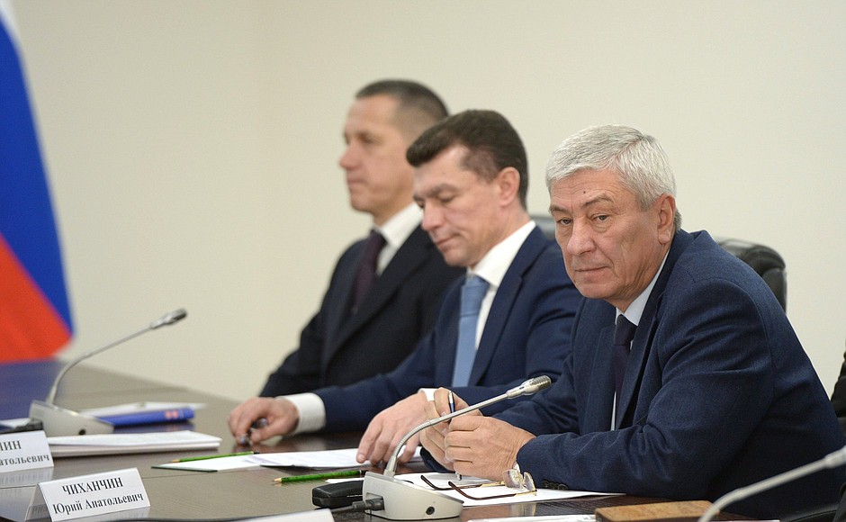 At a meeting on developing Vostochny Space Launch Centre. Deputy Prime Minister and Plenipotentiary Presidential Envoy to the Far East Federal District Yury Trutnev, Labour and Social Protection Minister Maxim Topilin, and Director of the Federal Service for Financial Monitoring Yury Chikhanchin.