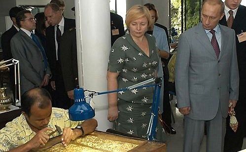 President Putin and Lyudmila Putin visiting the Support Foundation.