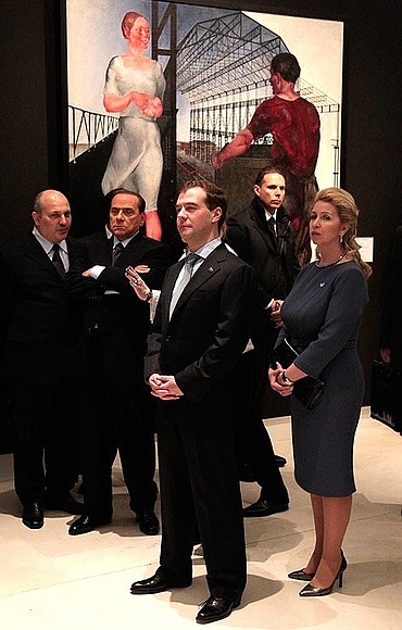 Dmitry and Svetlana Medvedev at the exhibition of works by artist Alexander Deineka. With Prime Minister of Italy Silvio Berlusconi.