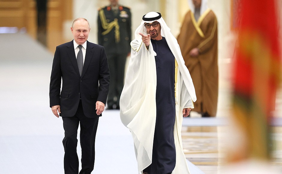 With President of the UAE Mohammed bin Zayed Al Nahyan during an official welcoming ceremony for Vladimir Putin.
