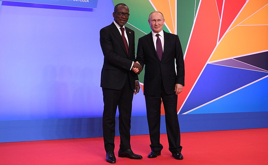 Official welcoming ceremony before the reception on behalf of the President of Russia in honour of the heads of state and government of the countries participating in the Russia-Africa Summit. With President of Benin Patrice Guillaume Athanase Talon.