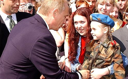 President Putin with city residents.