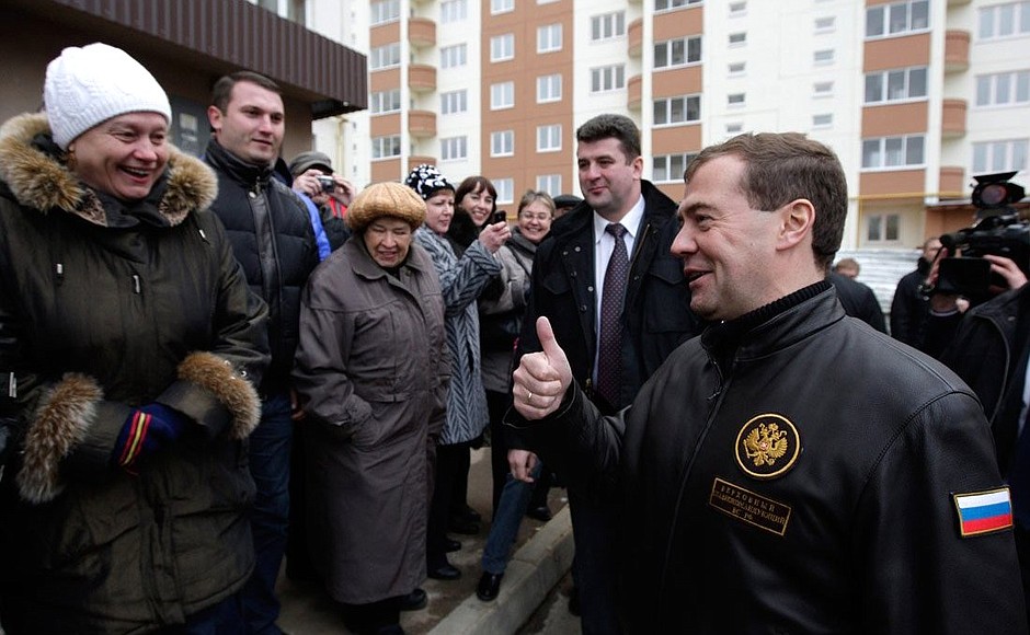 With residents of the military base at Timonovo settlement.