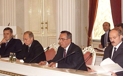 From right to left, President Vladimir Putin with Belarusian President Alexander Lukashenko, Belarusian Prime Minister Vladimir Yermoshin and Russian Prime Minister Mikhail Kasyanov during the first meeting of the Eurasian Economic Community.