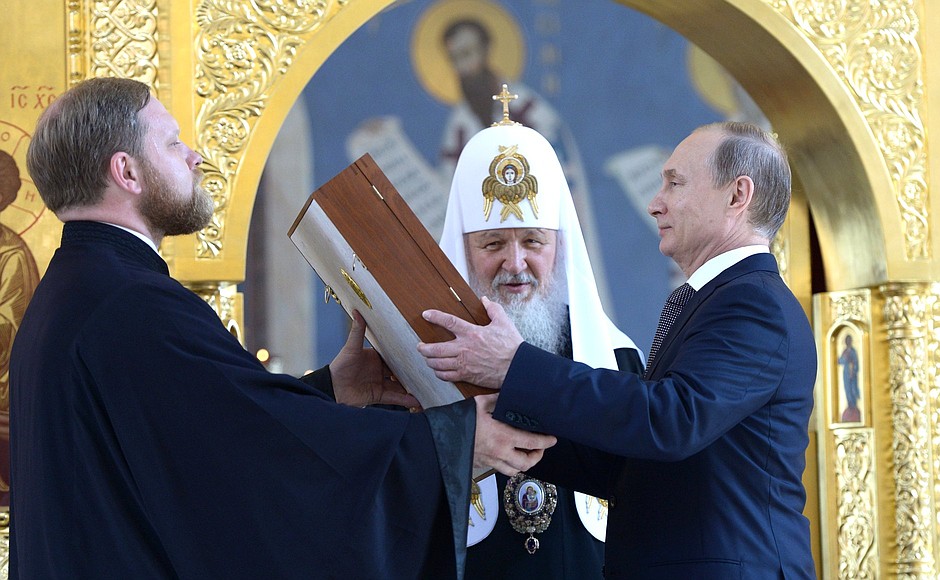 Patriarch of Moscow and All Russia Kirill presented Mr Putin with an icon of St Vladimir.