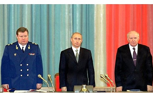 An all-Russian conference of prosecutors. President Vladimir Putin with Prosecutor-General Vladimir Ustinov (left) and Federation Council\'s Speaker Yegor Stroyev.