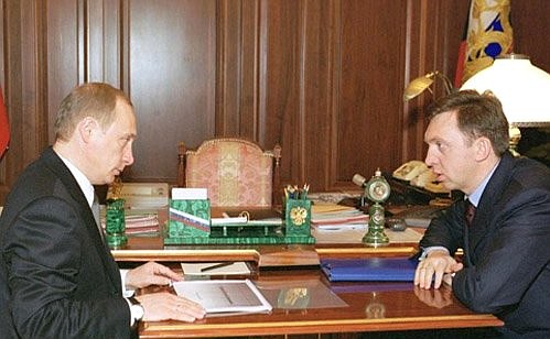 С генеральным директором ОАО «Русский алюминий» Олегом Дерипаской.