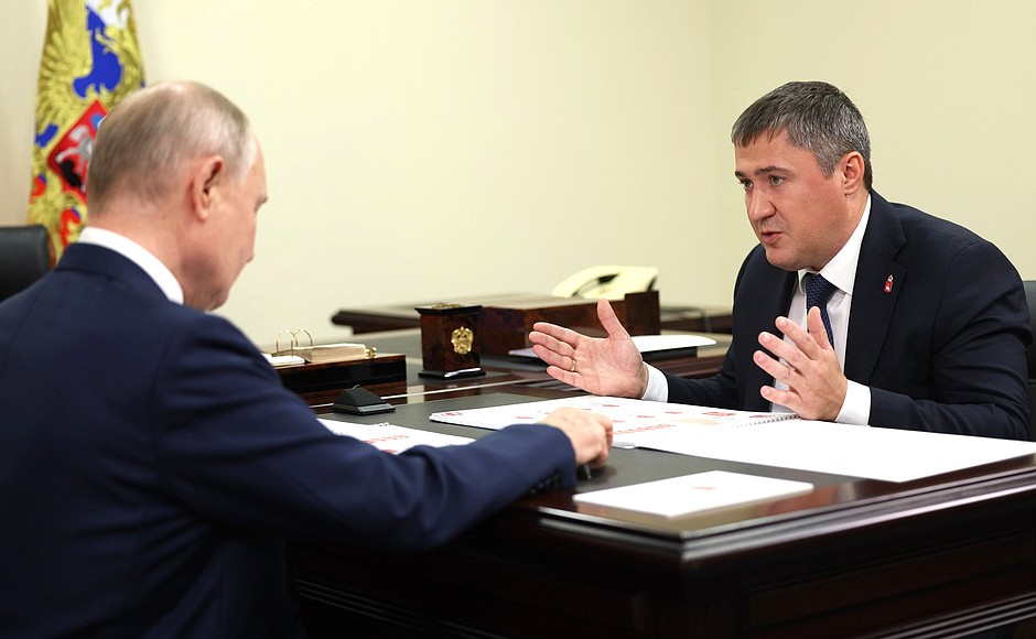 With Perm Territory Governor Dmitry Makhonin.
