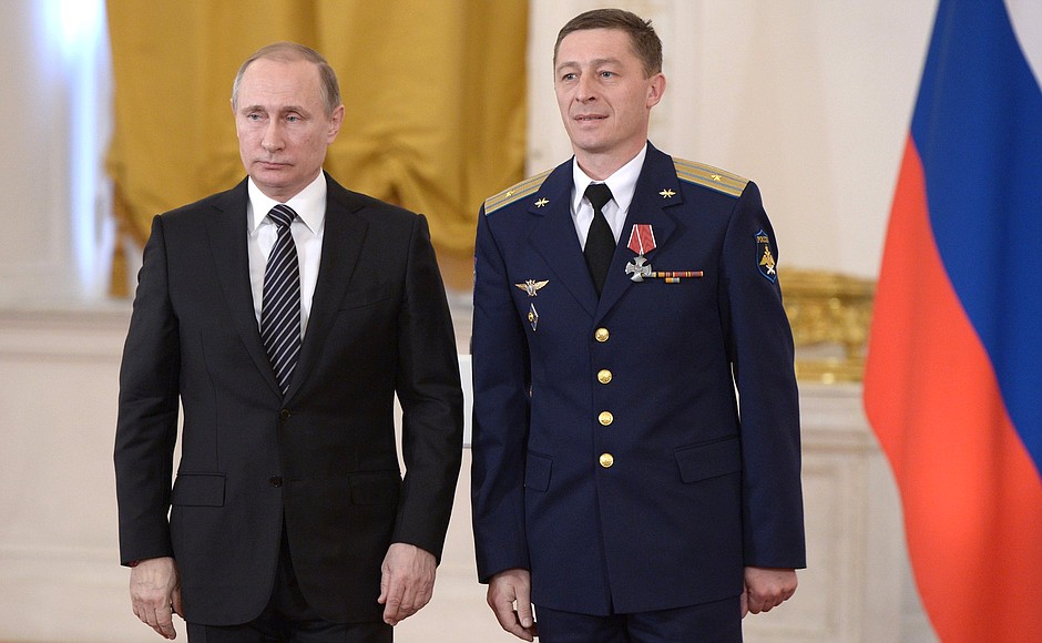 Major Andrei Zakharov is awarded the Order of Courage.