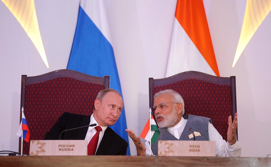 With Prime Minister of India Narendra Modi at the signing of Russian-Indian documents.