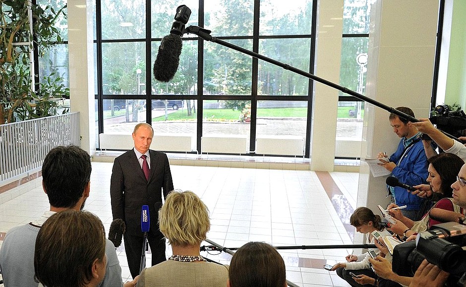 Vladimir Putin answers journalists' questions during his working trip to Leningrad Region.