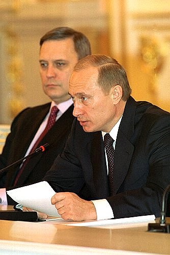 President Putin and Prime Minister Mikhail Kasyanov during a meeting of the State Council.