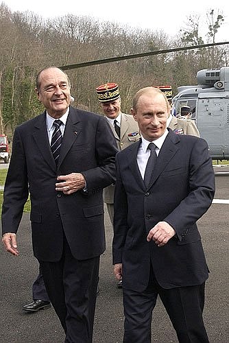 With French President Jacques Chirac at the air base.