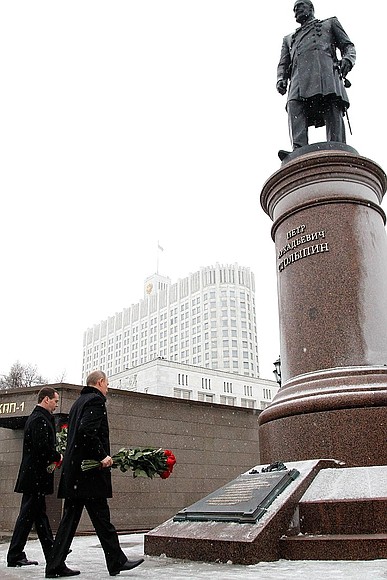 Vladimir Putin and Prime Minister Dmitry Medvedev lay flowers at the monument to Pyotr Stolypin.