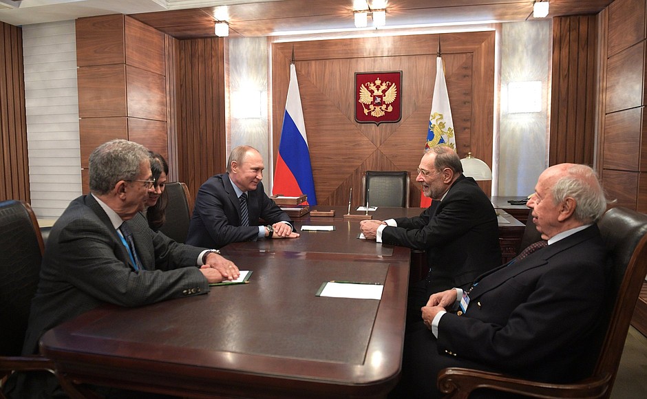 Vladimir Putin met with former Secretary-General of the Arab League Amr Moussa (left), former Prime Minister of Italy Lamberto Dini (right), and former NATO Secretary General Javier Solana on the sidelines of the Primakov Readings International Forum.