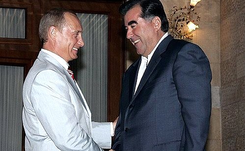 With the President of Tajikistan, Emomali Rakhmonov.
