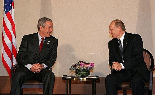 With U.S. President George W.Bush.
