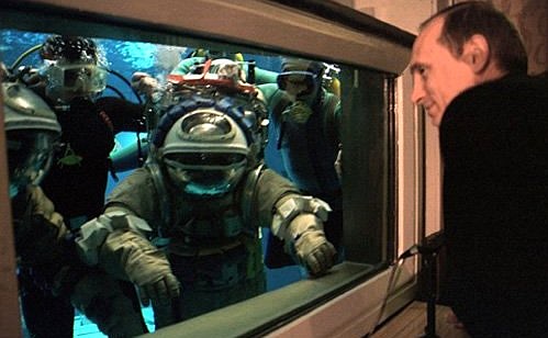 The Cosmonaut Training Centre. Vladimir Putin observing the work of test engineers in a water immersion facility.