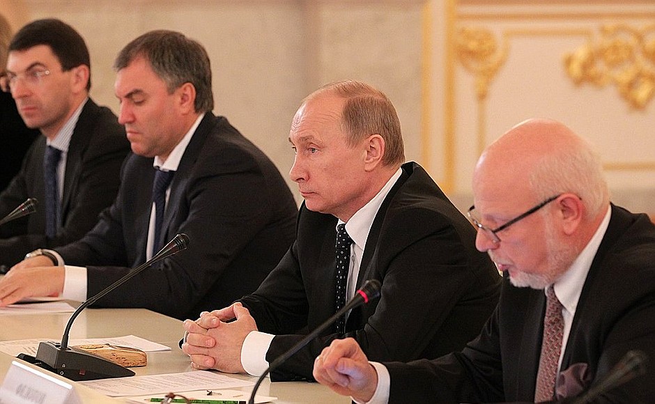 With Presidential Adviser and Chairman of the Council for Civil Society Development and Human Rights Mikhail Fedotov (right), First Deputy Chief of Staff of the Presidential Executive Office Vyacheslav Volodin, and Presidential Aide Igor Shchyogolev (far left).