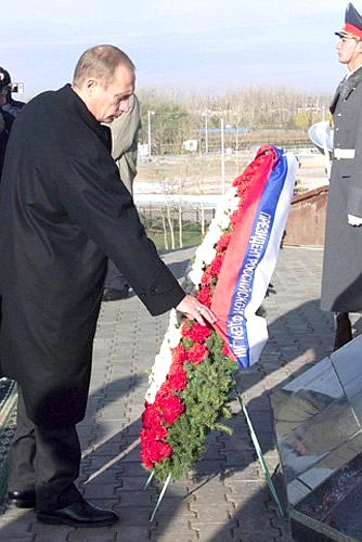 Laying a wreath at the memorial to the victims of political repression.