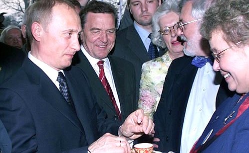 President Putin and German Chancellor Gerhard Schroeder before a concert of Russian and German musicians.