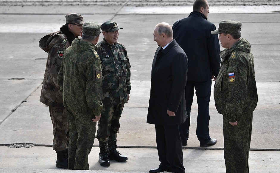 With Minister of National Defence of the People’s Republic of China Wei Fenghe, centre, Russian Defence Minister Sergei Shoigu and Chief of the General Staff of the Russian Armed Forces, First Russian Deputy Defence Minister Valery Gerasimov, right, after the Vostok 2018 military manoeuvres.