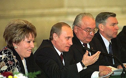President Putin with Deputy Prime Minister Valentina Matvienko, left, Moscow State University Rector Viktor Sadovnichy and Education Minister Vladimir Filippov, right, at the 7th congress of the Russian Rectors\' Union.