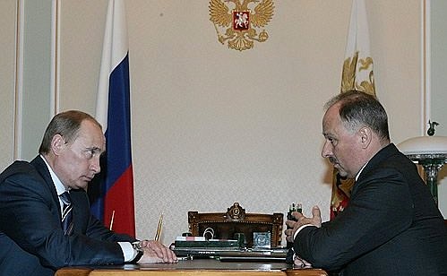 С председателем Внешэкономбанка Владимиром Дмитриевым.