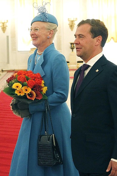 With Queen Margrethe II of Denmark.